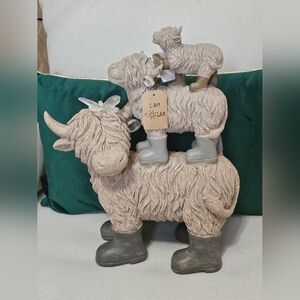 Stacked Highland Cow With Boots Solar Garden Statue